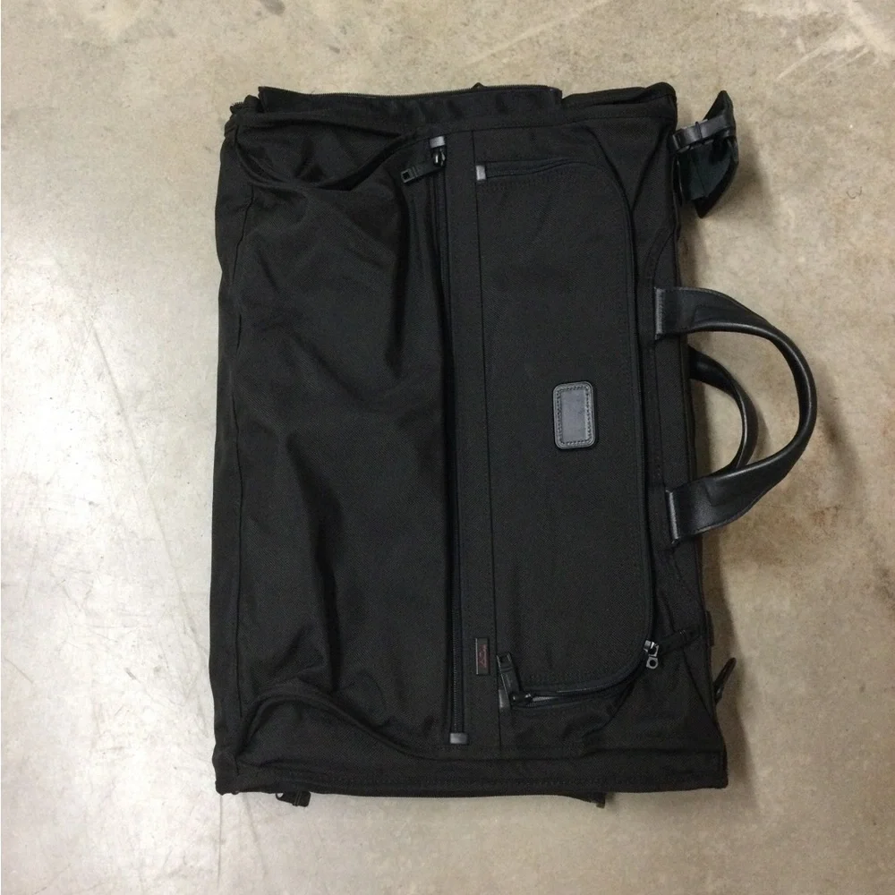 Tumi Black Men's Travel Duffel with Front Zip Pocket and Carry Handles
